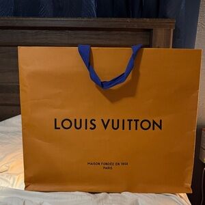 Louis Vuitton Bold Orange Bag with Blue Handles